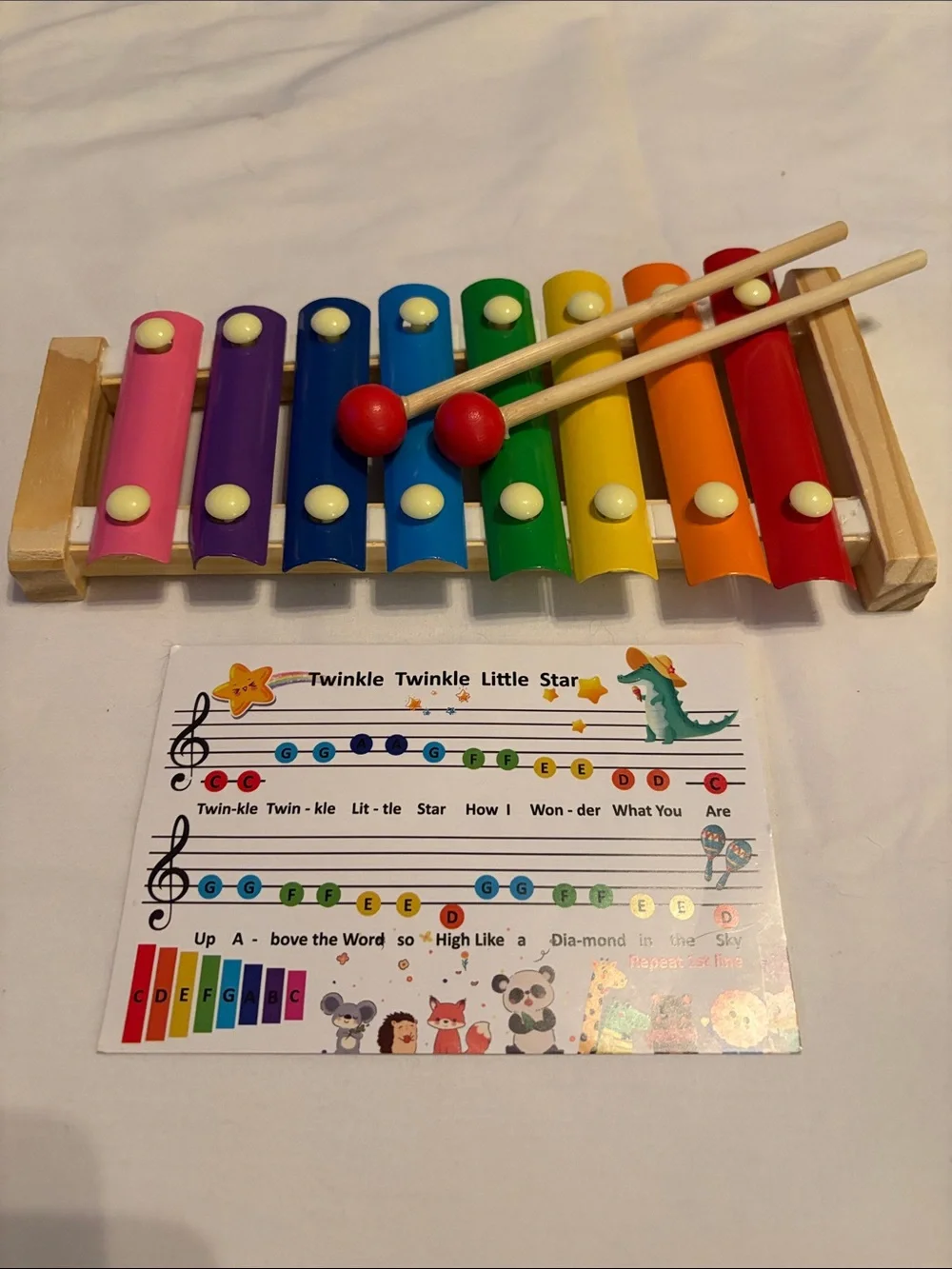 Multicolor Kids Wooden Musical Instrument Set with backpack.